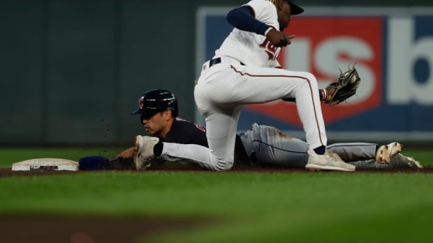 Sep 10, 2022; Minneapolis, Minnesota, USA; Cleveland Guardians left fielder Steven Kwan (38) steals second base ahead of the tag by Minnesota Twins second baseman Nick Gordon (1) in the fourth inning at Target Field. Mandatory Credit: Bruce Kluckhohn-USA TODAY Sports